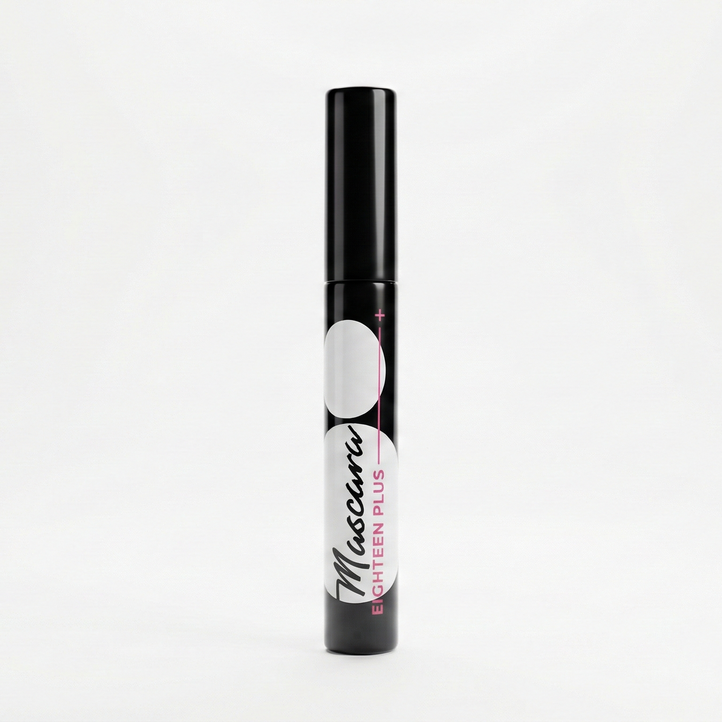 Black mascara tube with white label on a white background