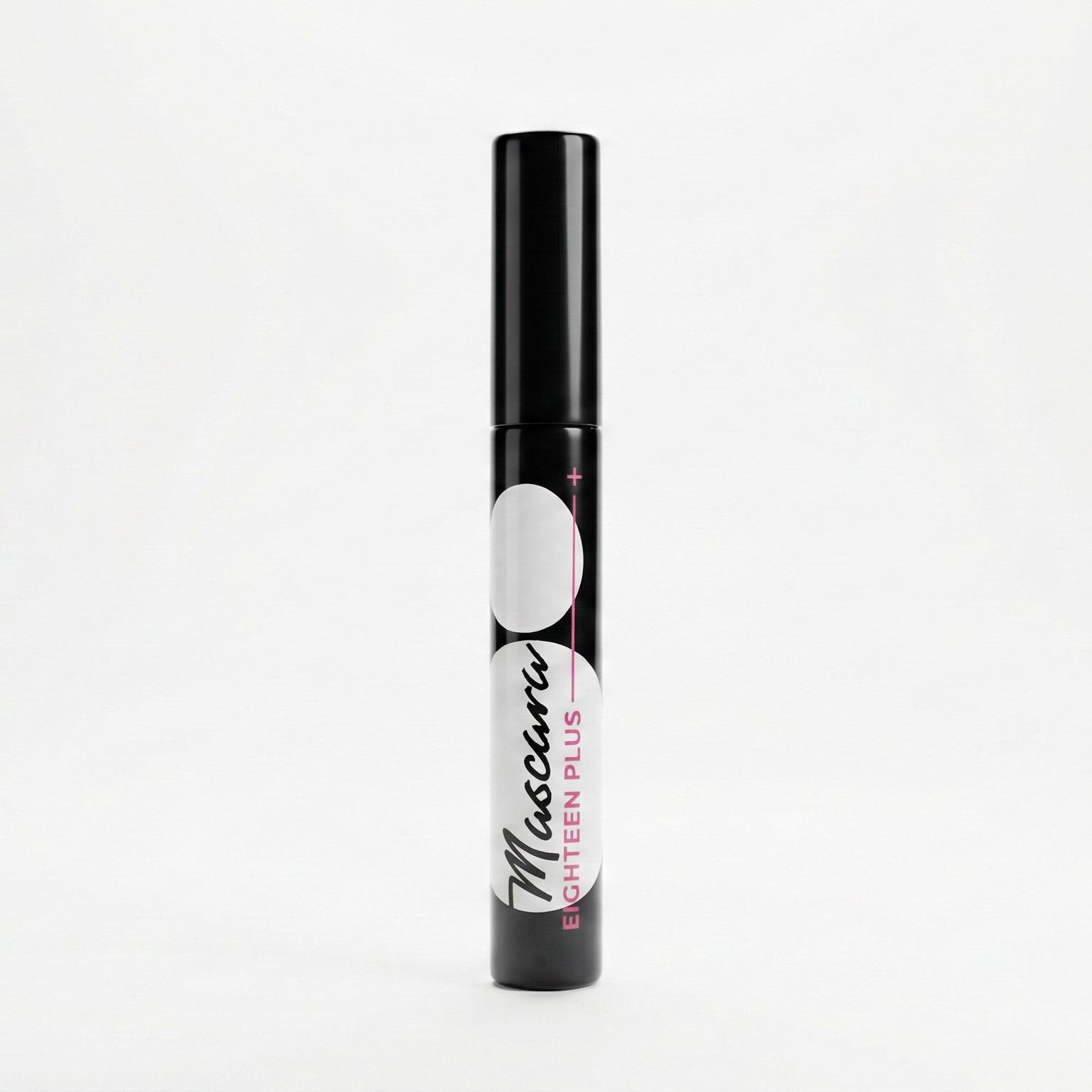 Black mascara tube with white label on a white background