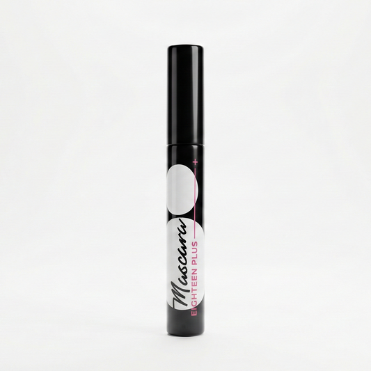 Black mascara tube with white label on a white background